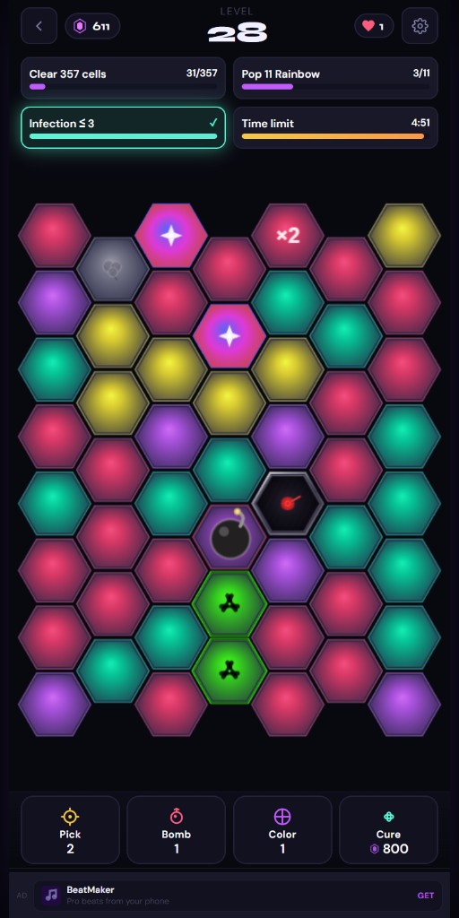 Journey level 28 mid-match with objectives and a colorful hex grid
